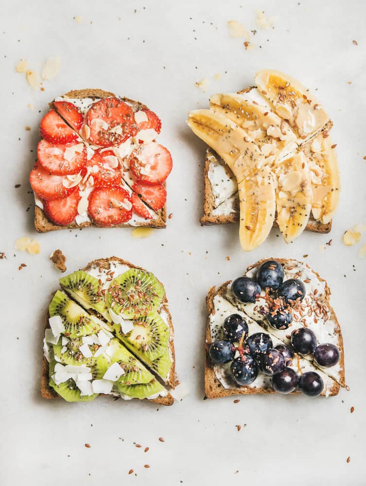 Healthy breakfast toasts with fruit, nuts and cream cheese Savvy Honey