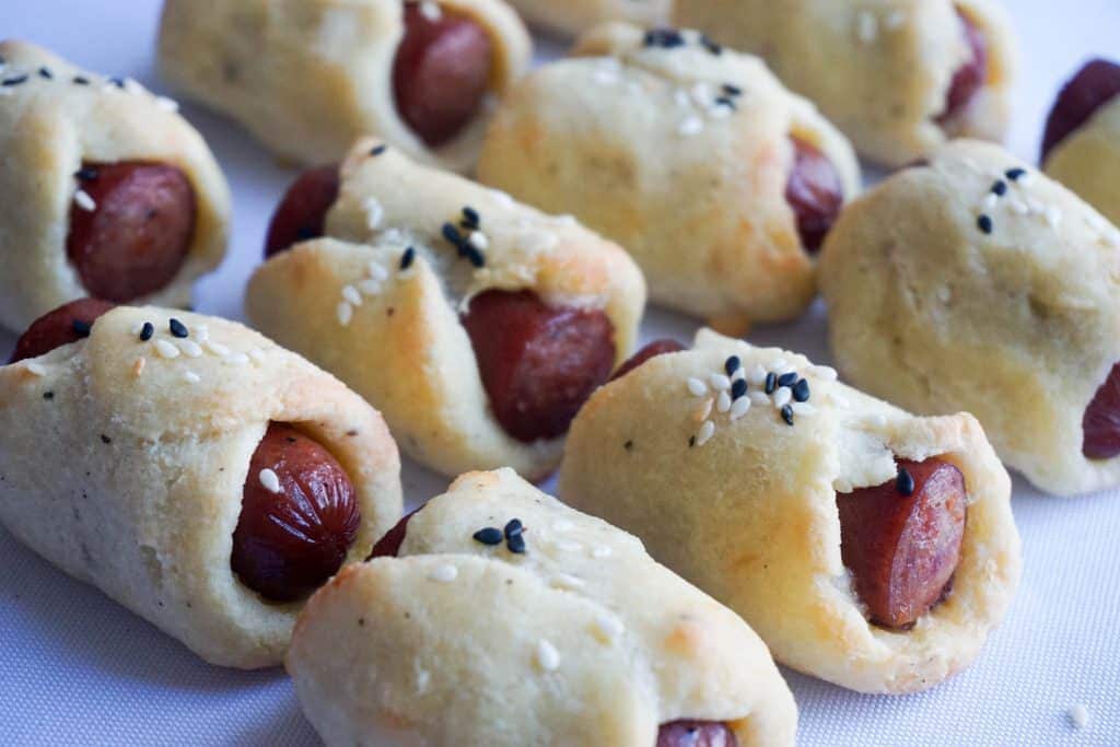 keto pigs in a blanket on light background