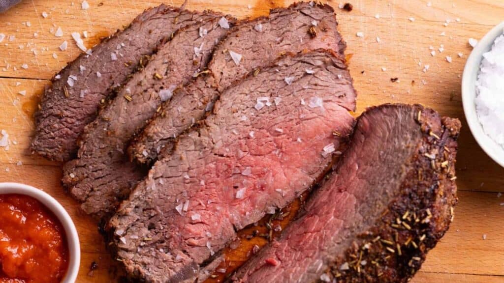 Air Fryer Roast Beef on a cutting board.