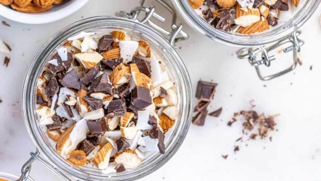 Chocolate and Coconut Overnight Oats in a jar on a light background.