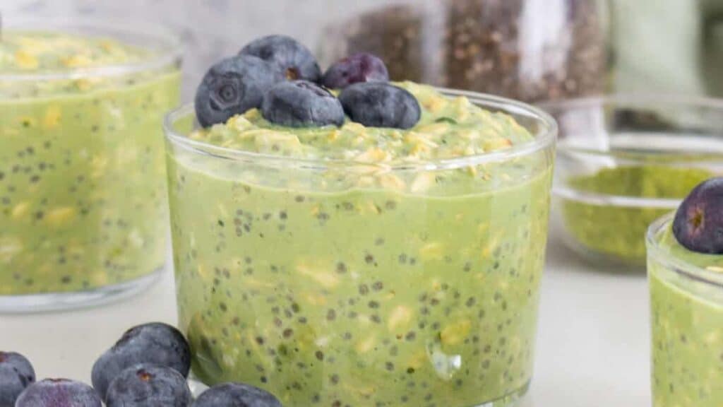 Matcha Overnight Oats with blueberries on a light background