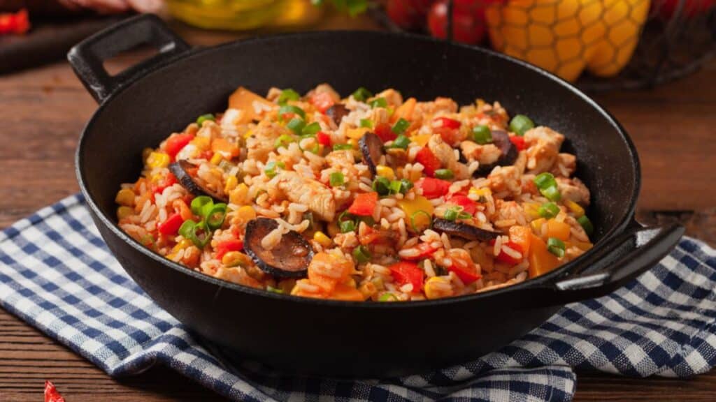 Cajun rice in a black skillet.