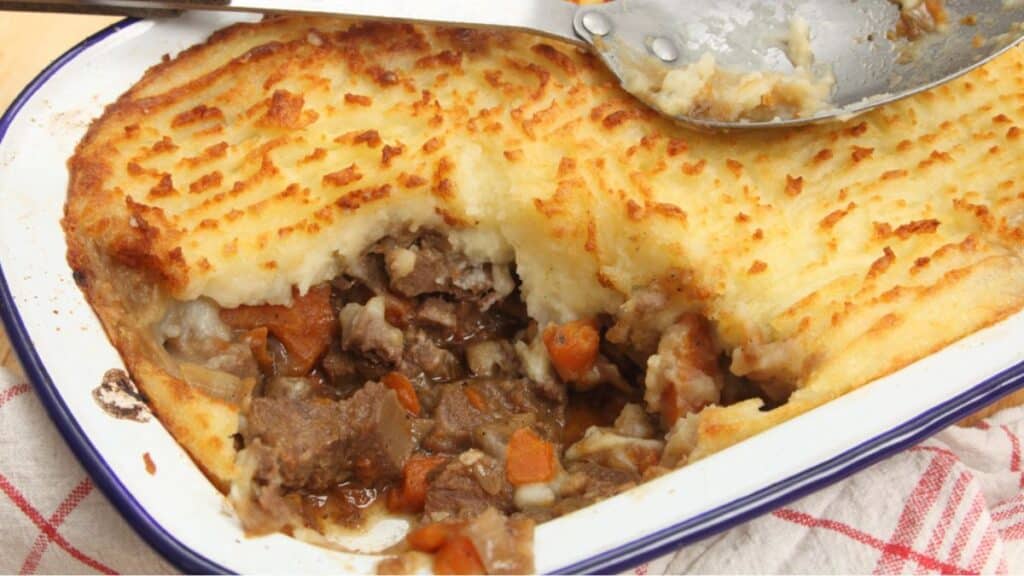 Pot pie on a white plate.