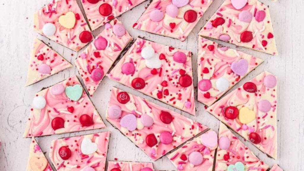 Candy bark broken into chunks with sprinkles over the top.