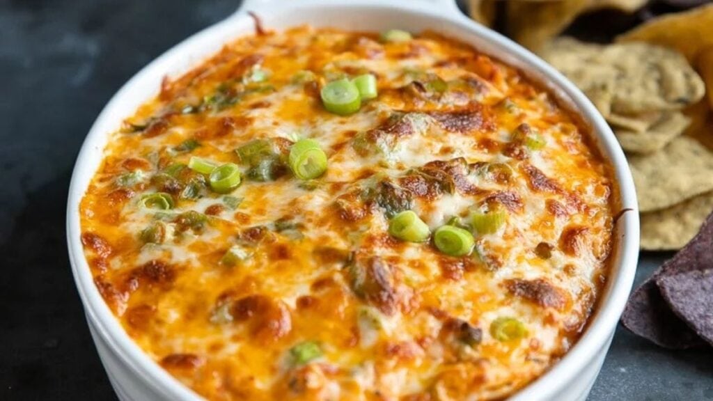 A creamy buffalo chicken dip in a white bowl