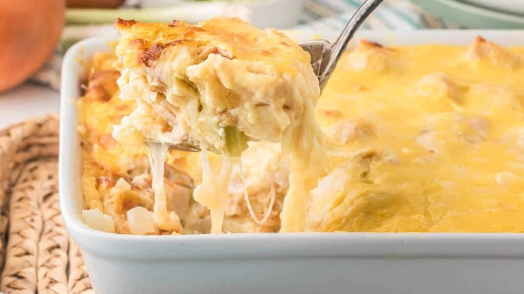 A chicken cordon bleu casserole being served. 