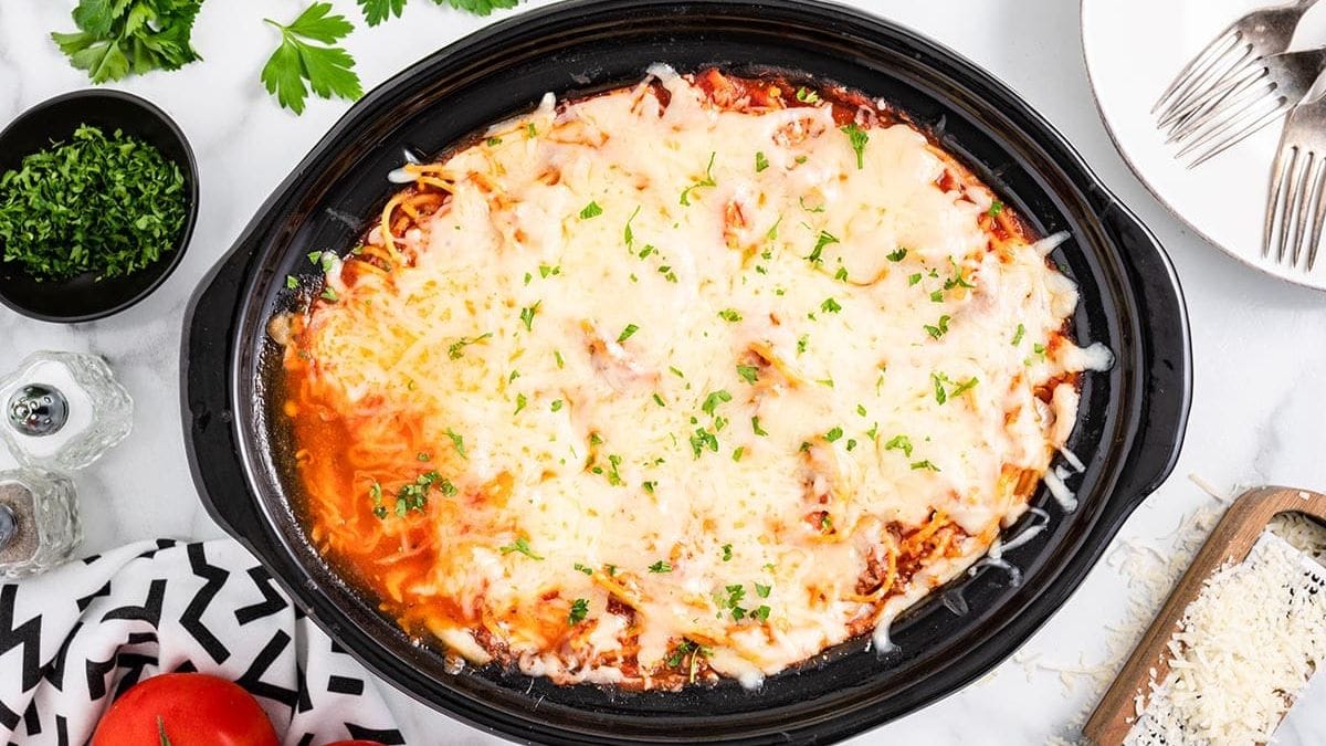 Spaghetti with baked cheese on top.