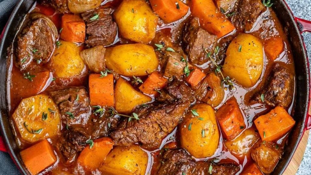 Beef stew with large chunks of beef, carrots, and potatoes. 