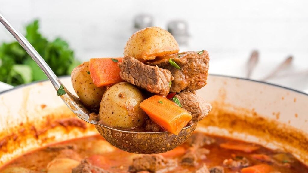 Hungarian goulash close up featuring the beef and veggies.