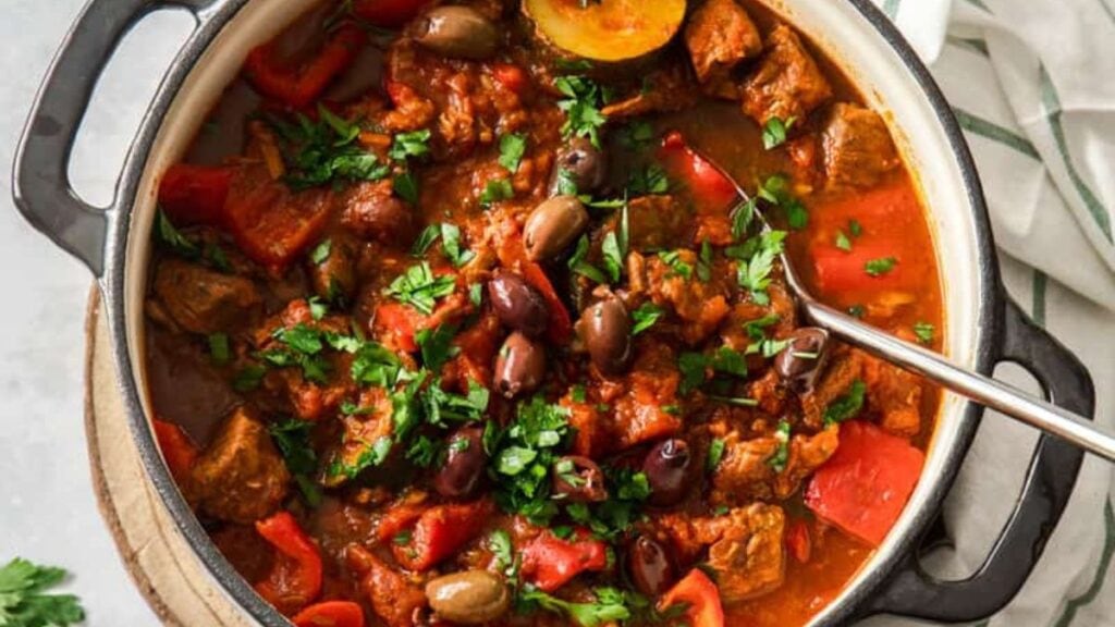 A bowl of Mediterranean beef stew made in the Dutch oven. 