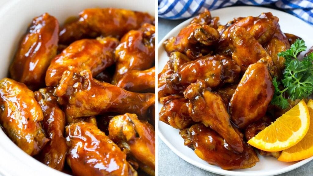 Chicken wings coated with sauce with sliced oranges.