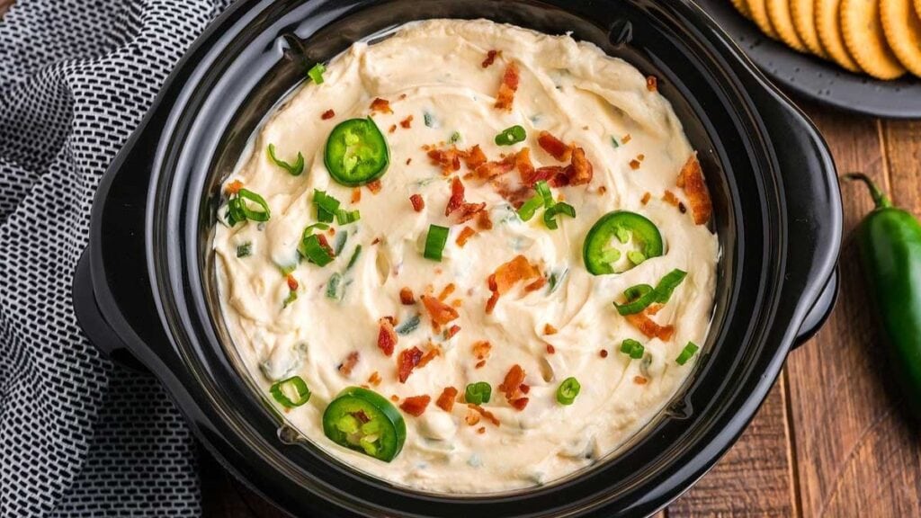 Jalapeno popper dip in crockpot.