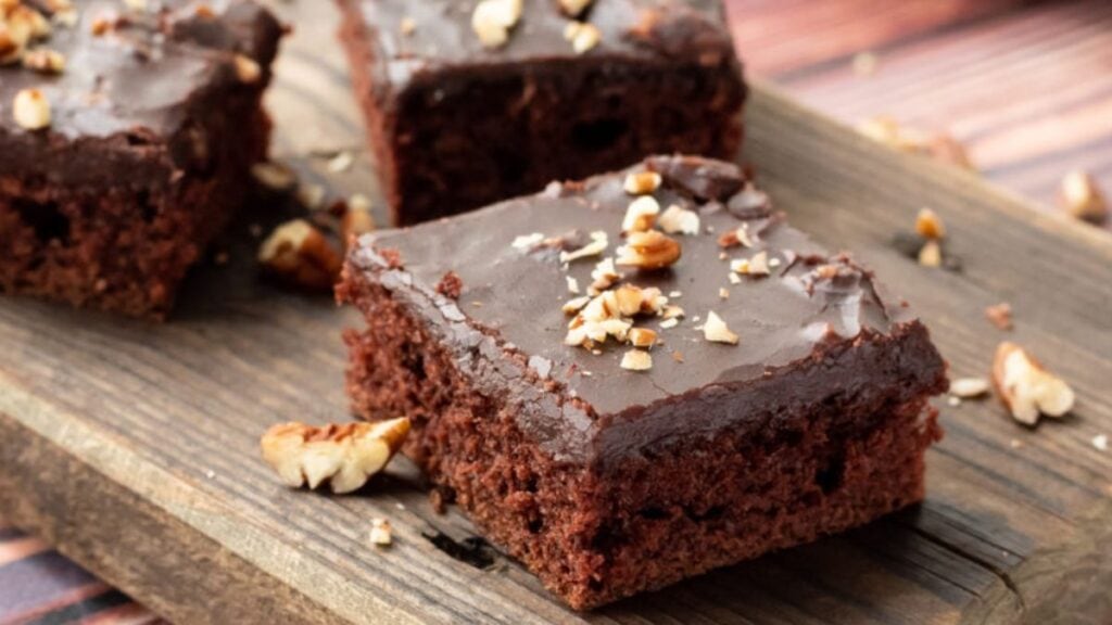 Pieces of chocolate Texas sheet cake.