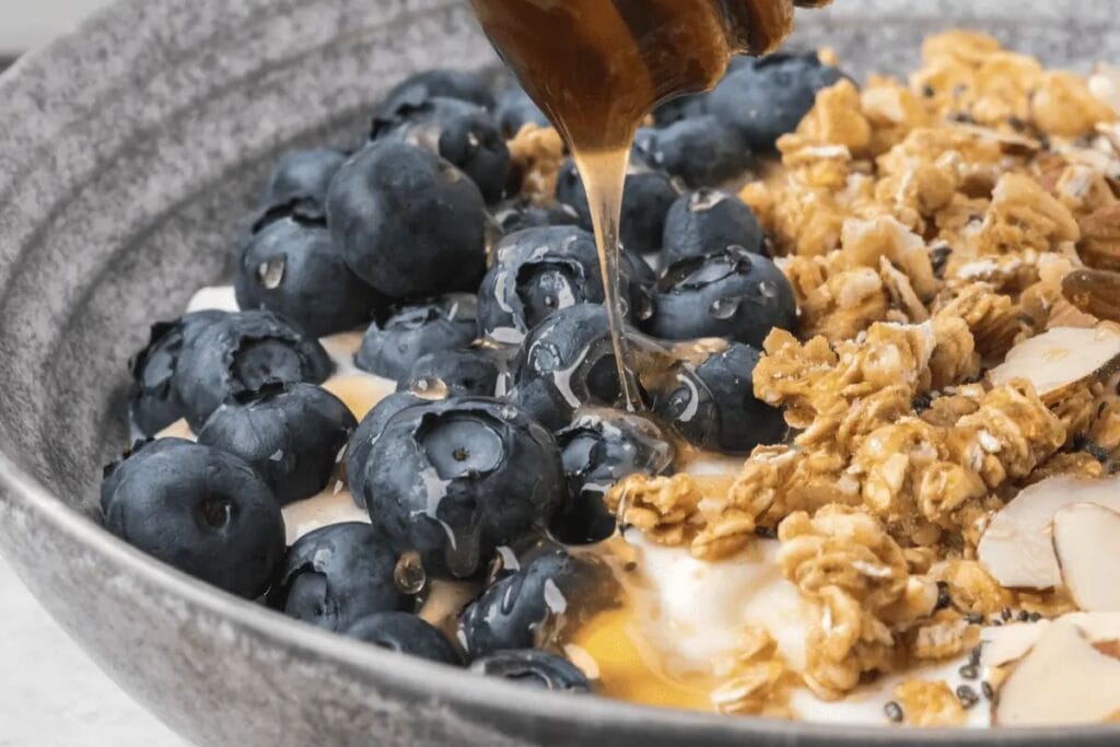 Blueberries, oats and cottage cheese in a bowl.