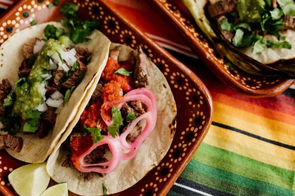 Carne Asada Tacos on a plate.