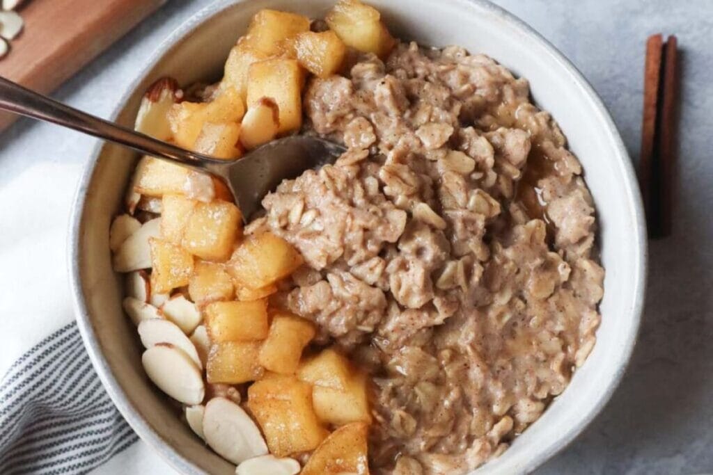 Cinnamon oatmeal with apples and brown sugar.