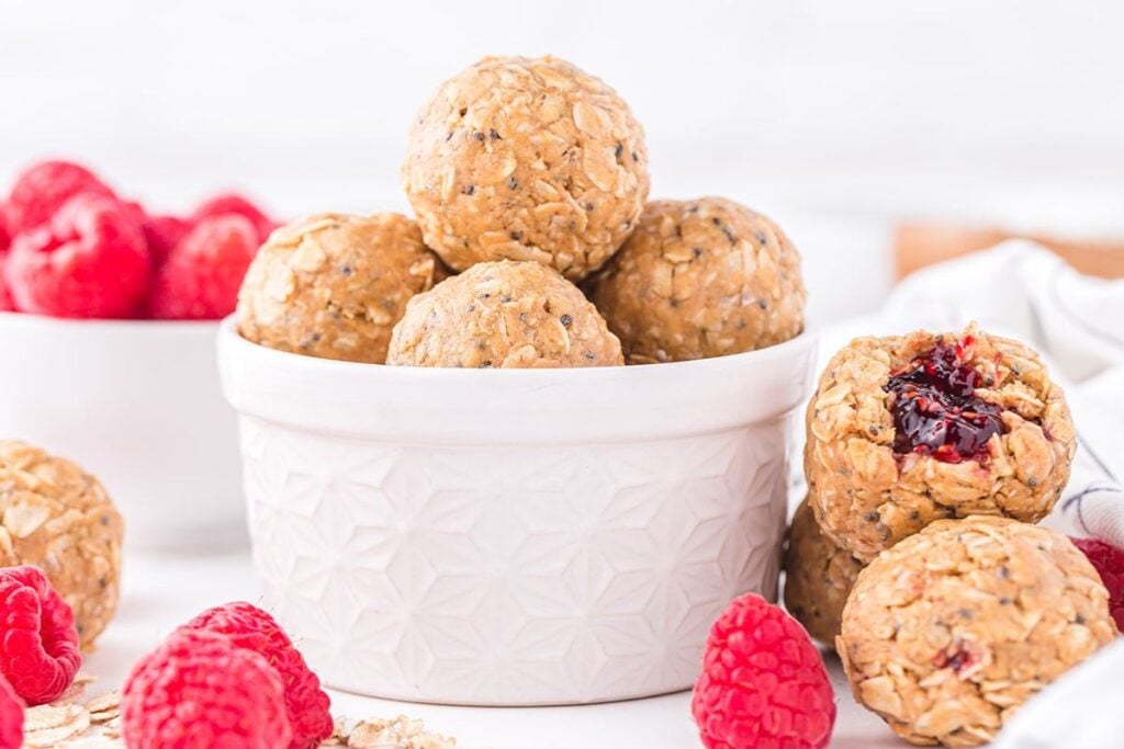 Peanut butter jelly balls in a bowl.