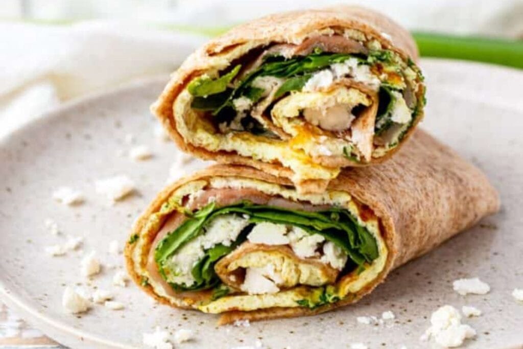 Wrap filled with salmon spinach and egg whites.