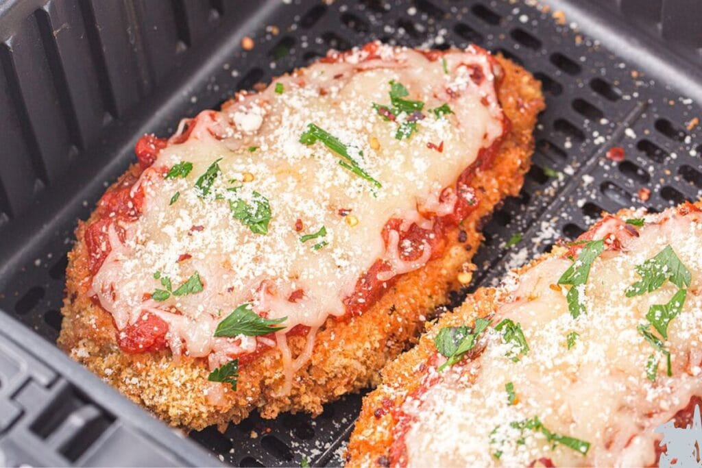 Chicken parmesan in an air fryer.