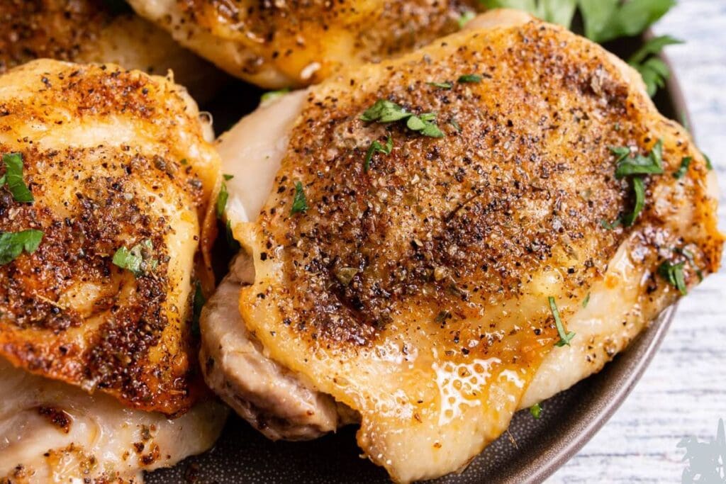 Close up shot of chicken thighs.