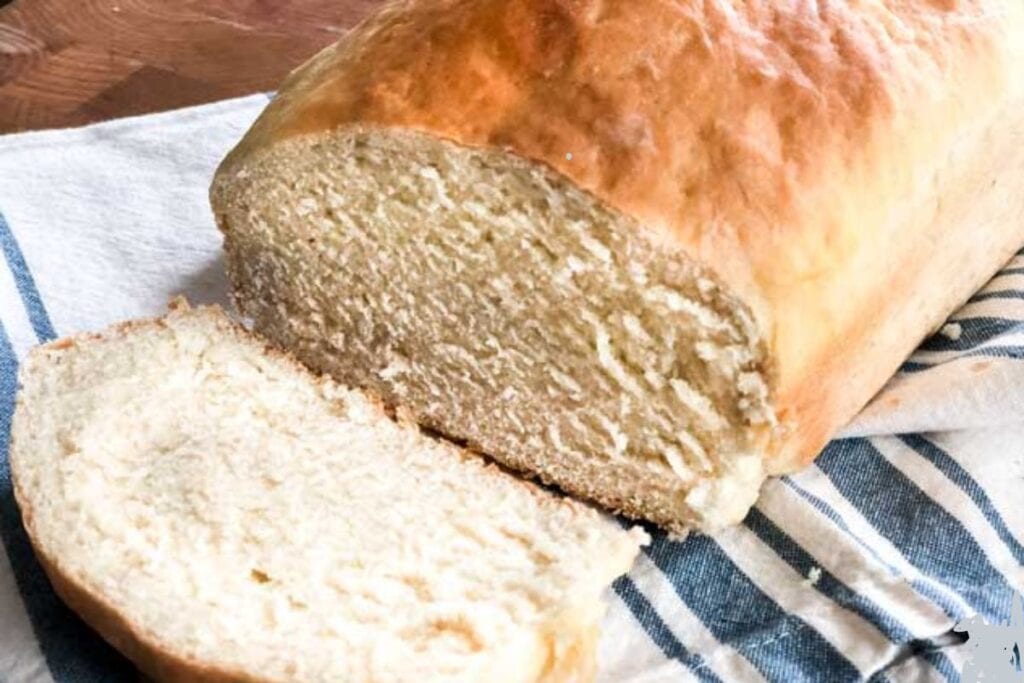Sliced amish bread on a cloth.