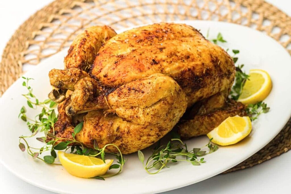 Whole chicken on a plate.