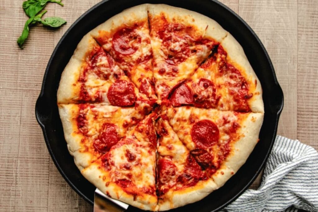 Skillet pizza in a pan.