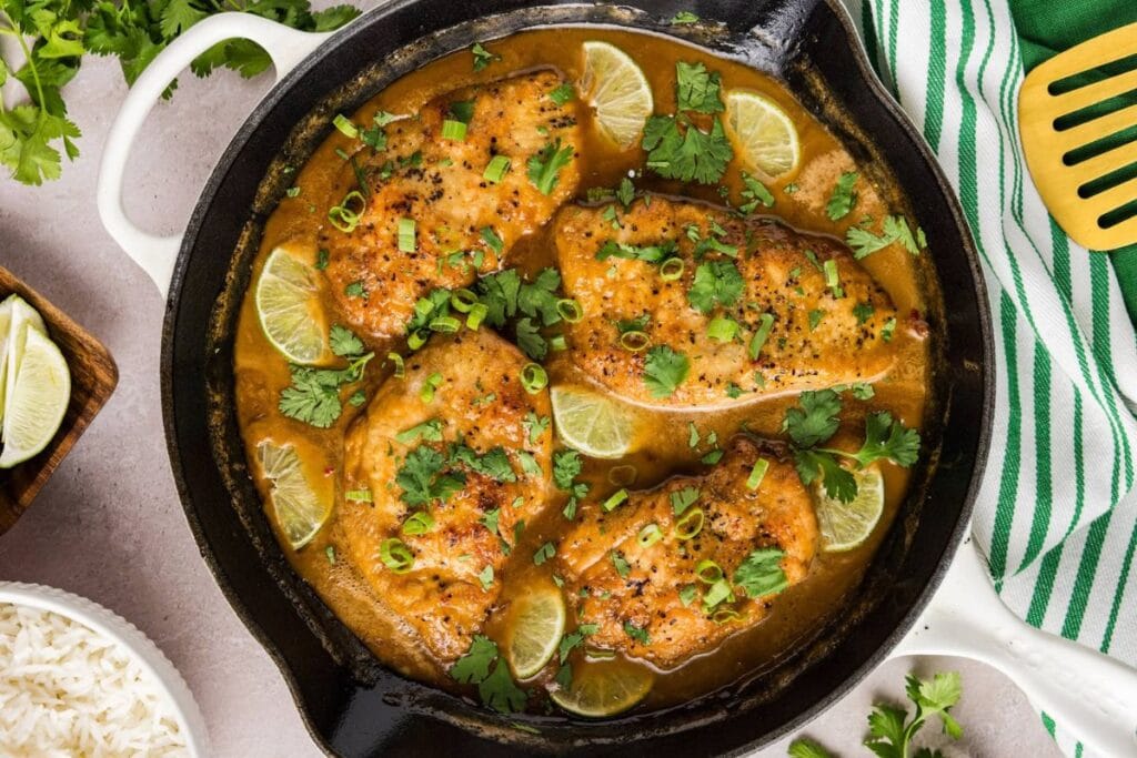 Coconut chicken in a pan.