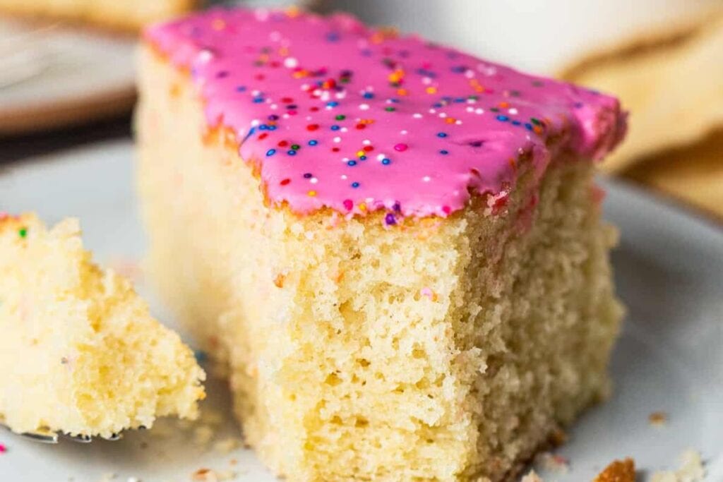 A slice of cake on a plate.
