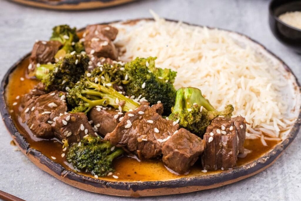 Beef and broccoli on a plate.