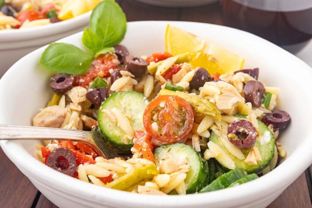 Tuna orzo salad in a bowl.