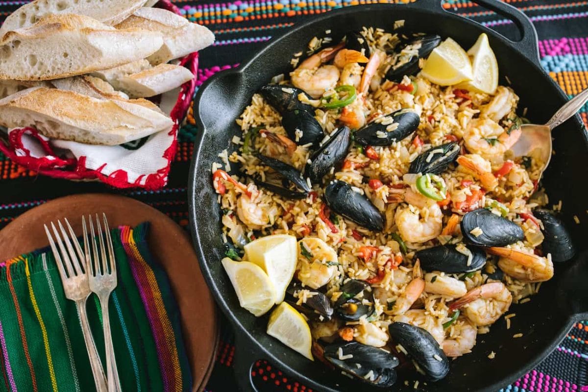 Seafood paella in a pan.