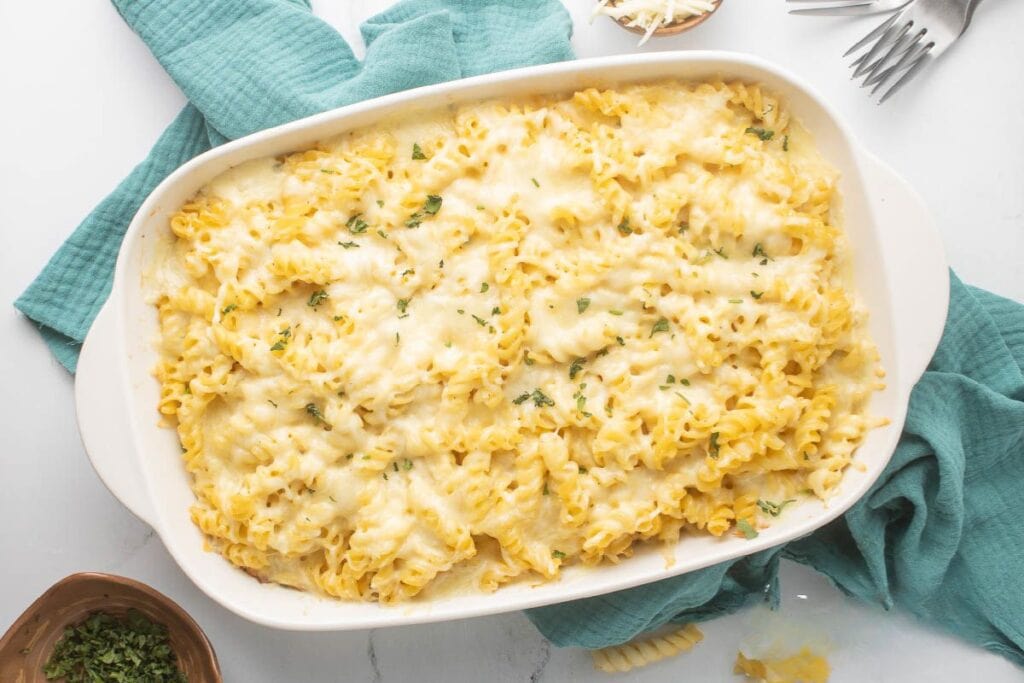 Pasta bake in a white dish.