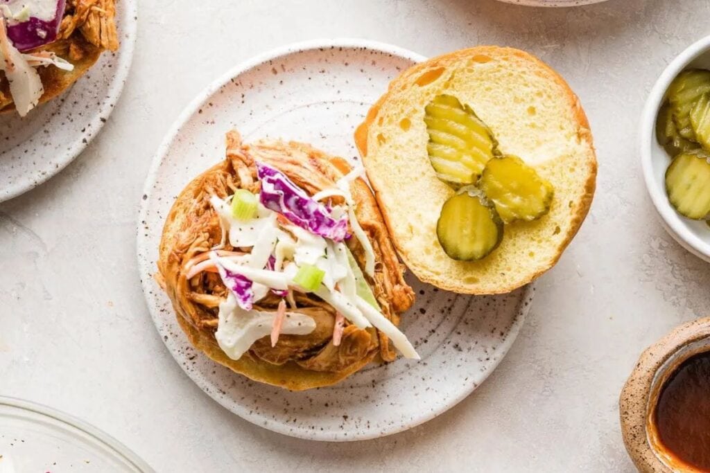 Chicken sandwich on a plate.
