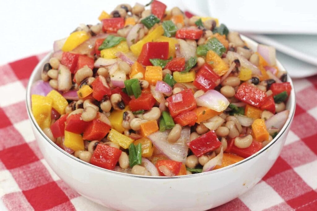 A bowl of black eyed peas bean salad.