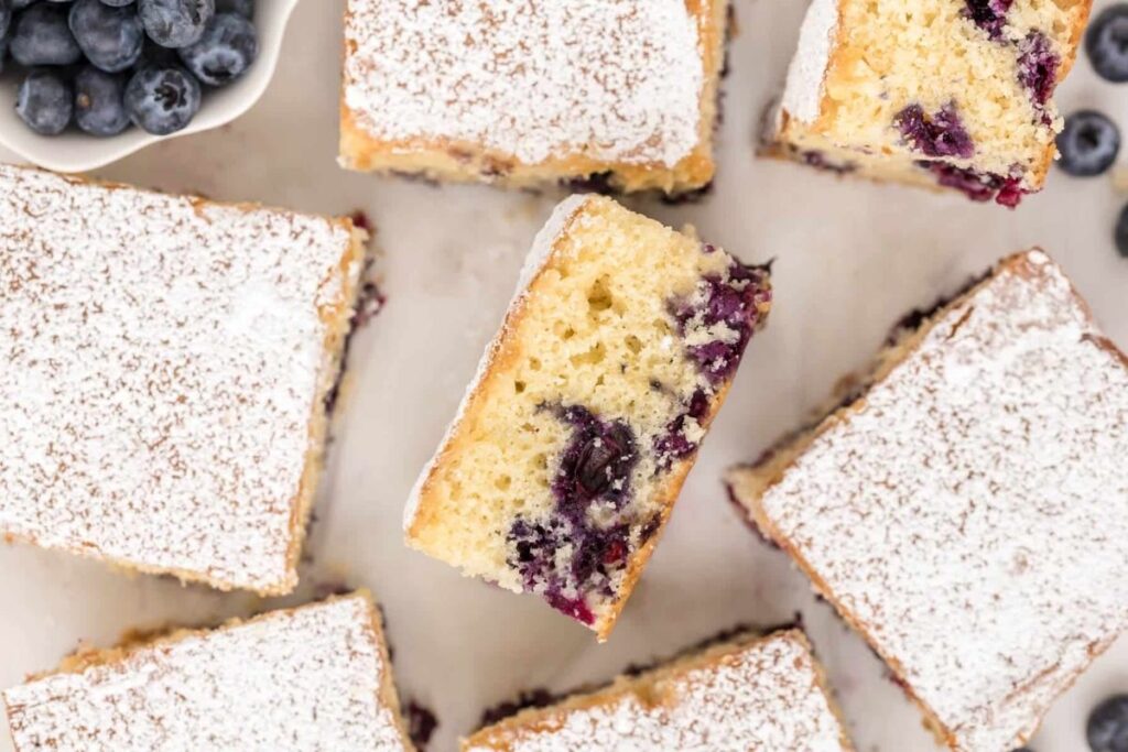 Sliced cakes with blueberries.
