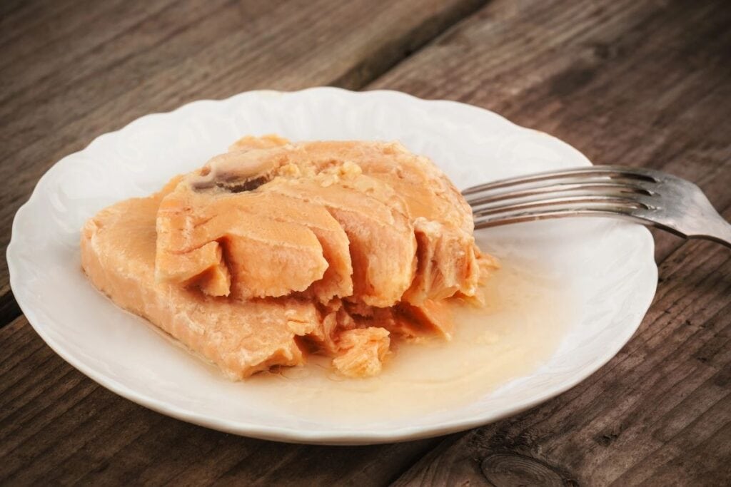 Canned salmon on a plate.