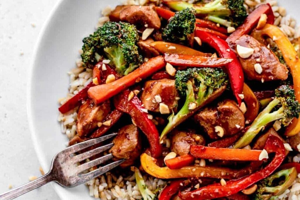 Chicken stir fry on a plate.
