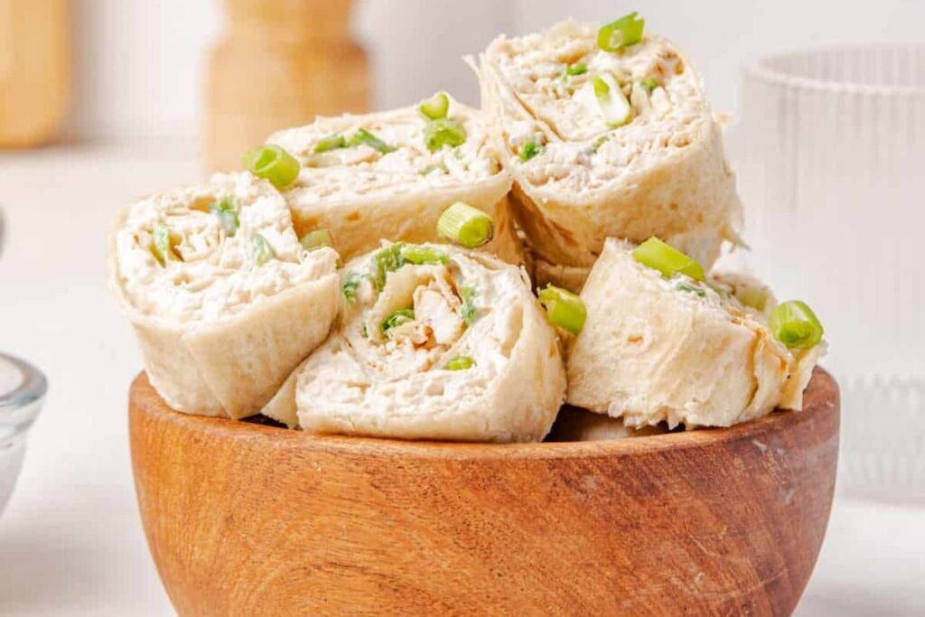 Chicken taco pinwheels in a bowl.