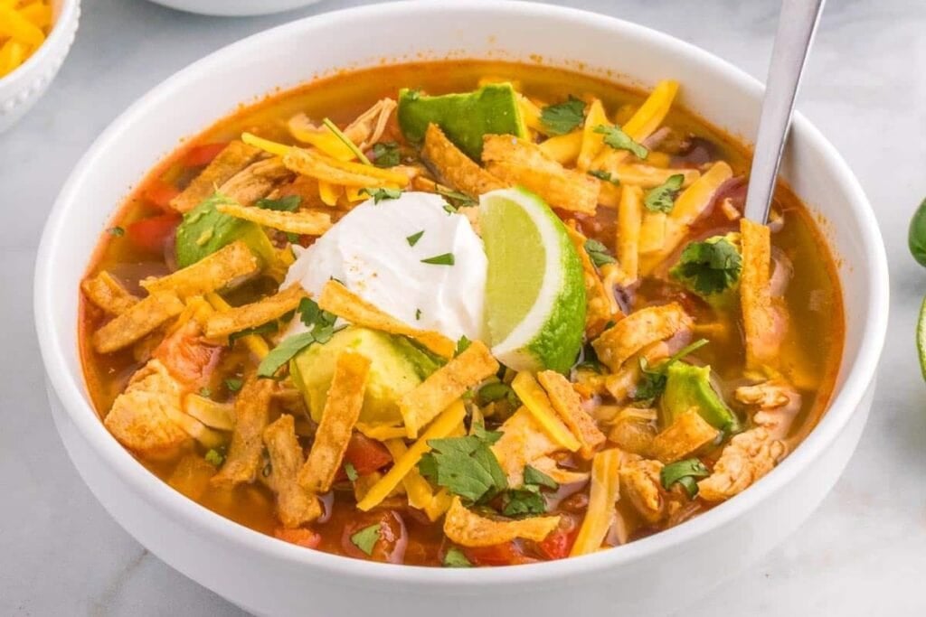 A bowl of chicken tortilla soup.