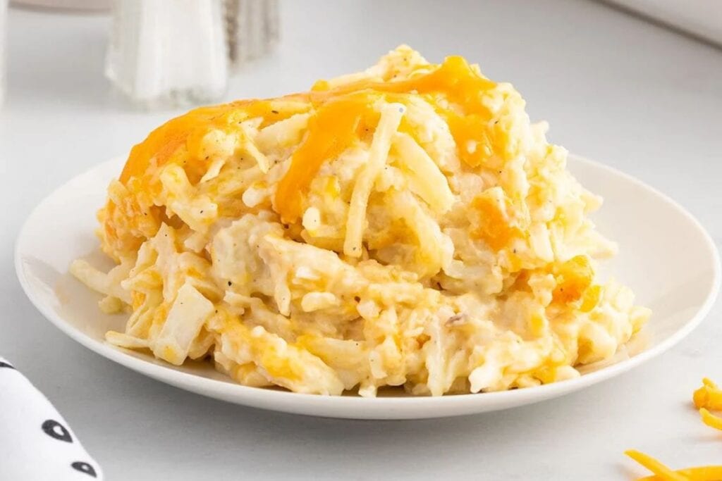 Hash brown casserole on a plate.