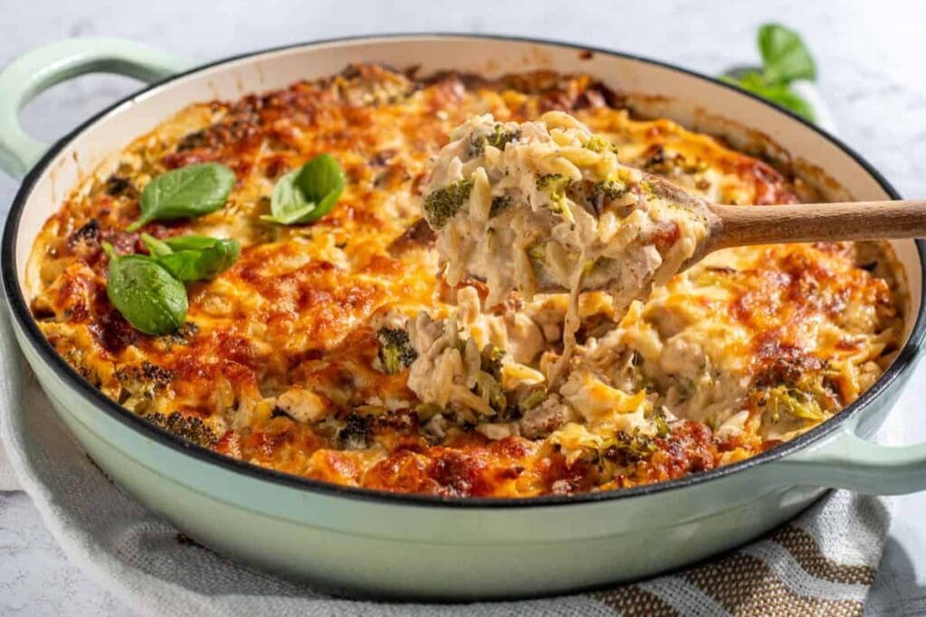 Chicken orzo pasta bake in a pan.