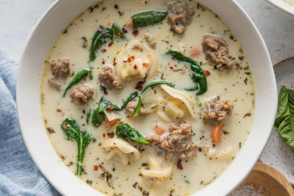 Tortellini soup in a bowl.