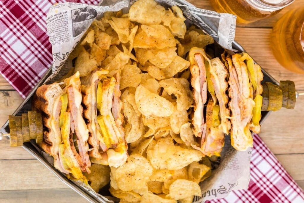 Cuban sandwich with potato chips.