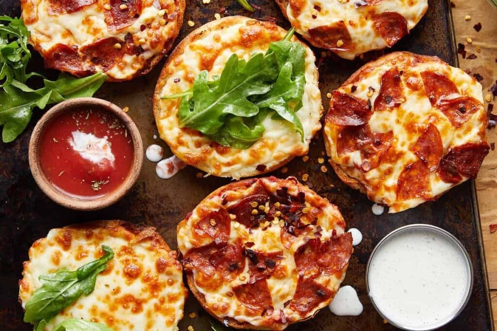 Muffin pizzas with dips.