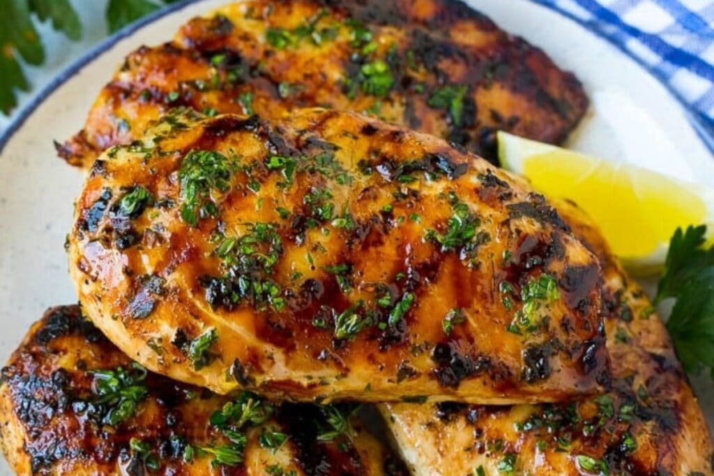 Grilled chicken close up shot.