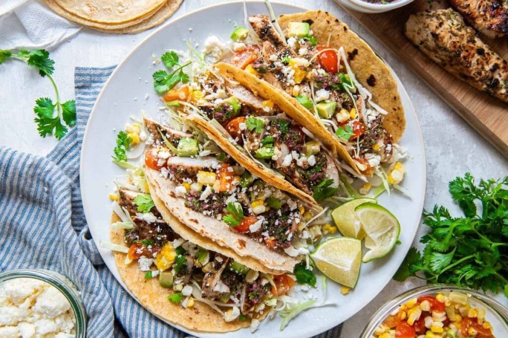 Chicken tacos on a plate.