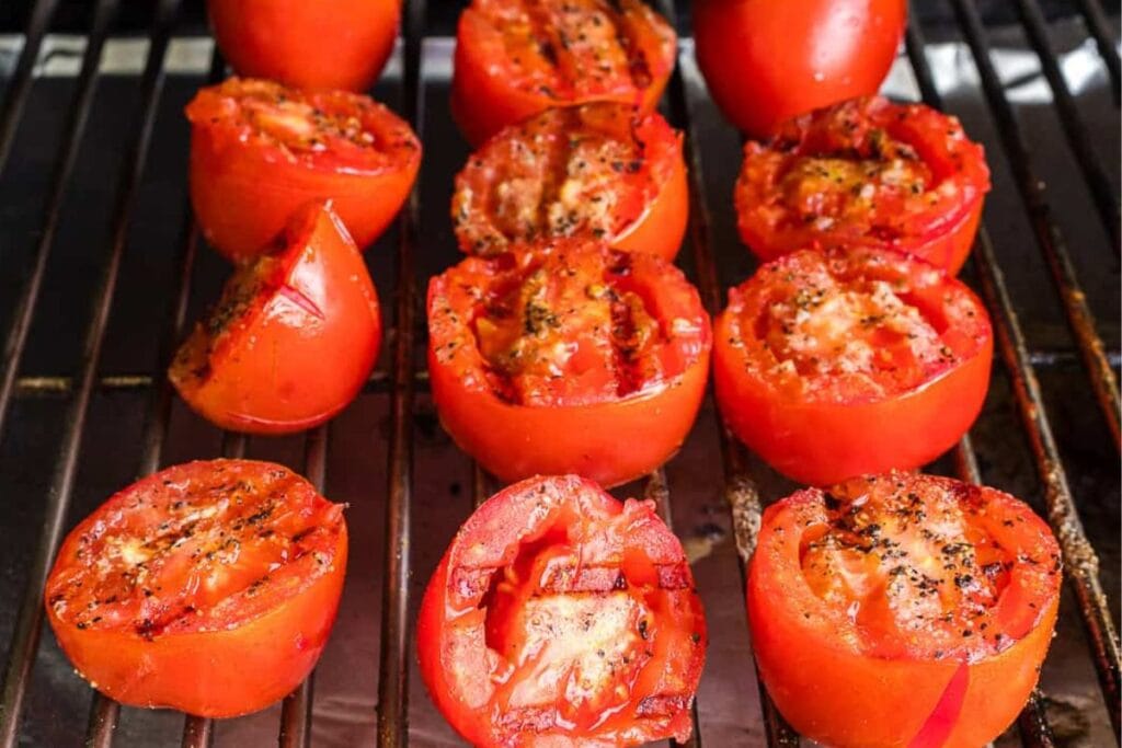 Grilled tomatoes on griller.