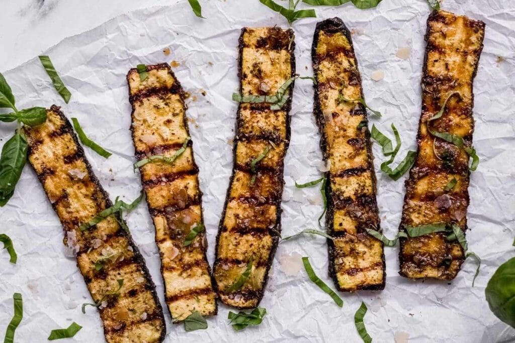 Grilled zucchinis close up shot.