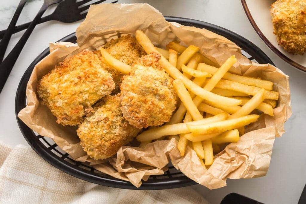 Chicken nuggets on a plate.